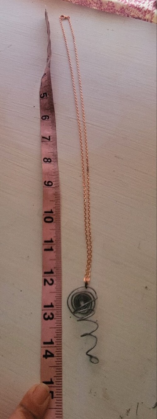 Handmade Sprial Flower Holding Pendant On Rose Gold Chain